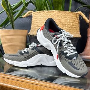 Sorel womens Gray and Black Sneakers with Red Accents